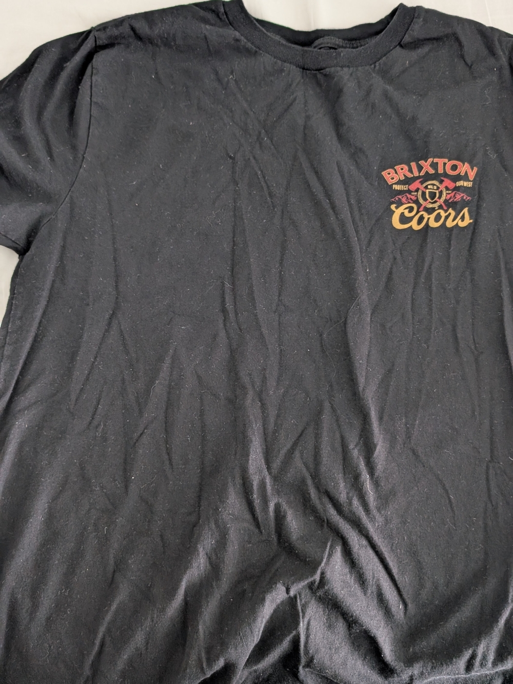 Brixton Black Short Sleeve Tee with Red and Gold Chest Graphic